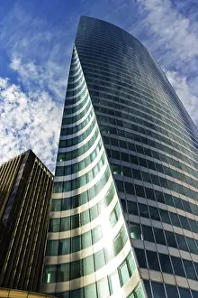 Contemporary Urban Landscape Drucke: Skyscraper under cloudy blue sky