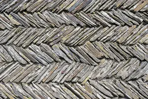 British Architecture Images Drucke: Slate slabs stacked in a herringbone pattern to form a wall