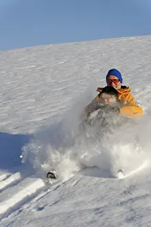 Recreational Winter Activities Drucke: Sledding