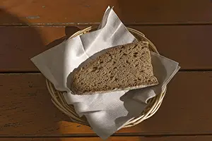 Bread Roll Nutrition Facts Drucke: A slice of bread in a bread basket with napkin