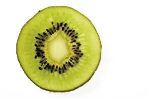 Close Up Kiwi Drucke: Slice of a kiwi fruit