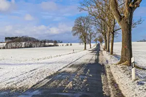 Deserted Snowy Landscape Drucke: Slippery road surface in winter