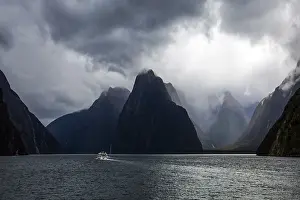 Nature Reserve Photography Drucke: Small boat sailing on the waves