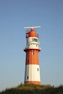 Atmospheric Lighthouse Scene Drucke: Small lighthouse in the evening light