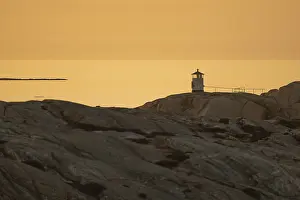 Scandinavian Archipelago Landscape Drucke: Small lighthouse at sunset, archipelago