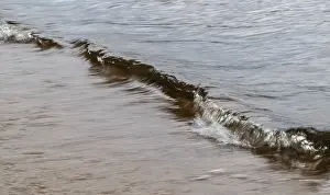 Open Air Waterfront Scene Drucke: Small wave, smudge effect, soft water
