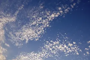 Uninhabited Landscape Photography Drucke: Small white clouds in blue sky