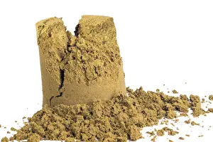 Bright Studio Background Photo Drucke: Smashed and destroyed sandcastle