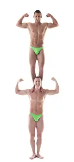 Elegance In Motion Drucke: Two smiling force acrobat posing in studio