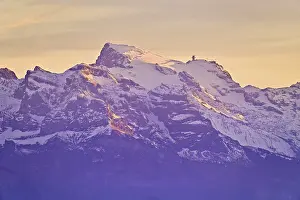 Evening Atmosphere In The Alps Drucke: Snow-covered Titlis in evening light