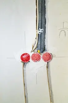 New Construction Site Drucke: Three sockets built into the wall