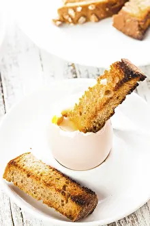 Dairy Product Meals Drucke: The soft-boiled egg in an eggcup with toasted bread
