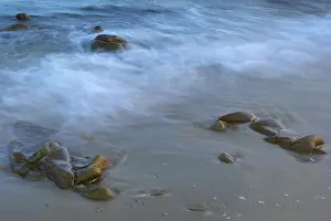 Western Europe Coastlines Drucke: Soft waves breaking on a beach