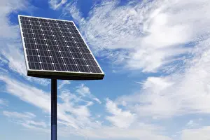 Photovoltaic System Drucke: Solar panel against a cloudy blue sky