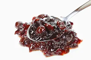 Cut Out Cherry Images Drucke: Sour cherry jam with a spoon