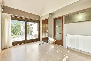 Minimalist Interior Design Drucke: A spacious interior featuring large windows that invite ample natural light