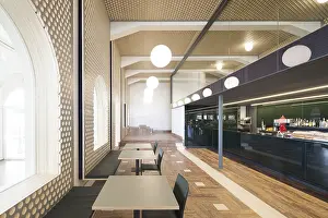 Geometric Wall Patterns Drucke: Spacious modern bar interior featuring unique geometric wall patterns