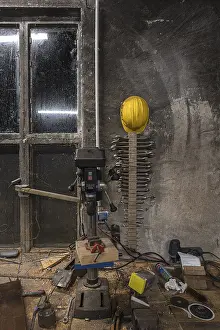 Northern Germany Scenes Drucke: Spanner and construction helmet on the wall of a workshop