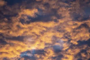 Cloudy European Landscape Drucke: Spectacular cloudy sky at sunset