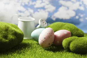 Easter Eggs On Grass Drucke: Spotted Easter eggs on the grass. Holiday concept