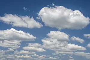 Cloudy Weather Europe Drucke: Spring clouds against blue sky