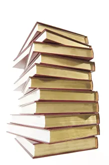 Deserted Book Pile Drucke: Stack of books isolated on a white background