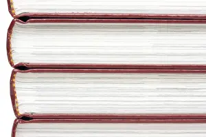 Deserted Book Pile Drucke: Stack of books isolated on a white background