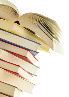 Isolated Books Drucke: Stack of books isolated on white background