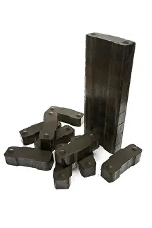 Power Generation Cost Drucke: Stack of brown coal briquettes