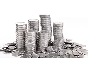 White Background Currency Drucke: Stack of coins isolated on a white background