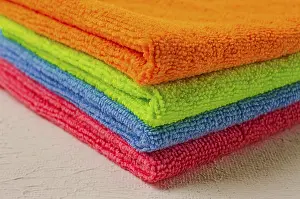 White Table Setup Drucke: A stack of colored cloth, microfiber
