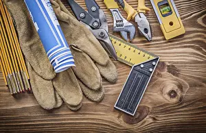 Construction Tools Drucke: Stack of construction tools on vintage wooden board