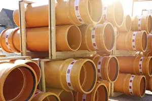 Mutterstadt Construction Site Drucke: Stack of KG pipes on a construction site in the Mutterstadt development area