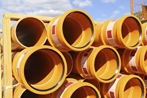 Deserted Construction Area Germany Drucke: Stack of KG pipes on a construction site in the Mutterstadt development area