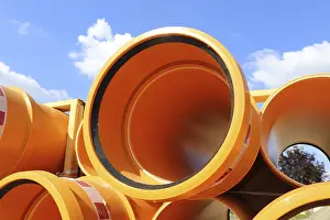 Deserted Construction Area Germany Drucke: Stack of KG pipes on a construction site in the Mutterstadt development area