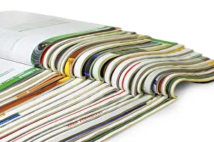 Bright White Background Cutout Drucke: Stack of magazines isolated on white background