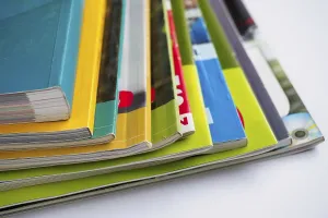 Magazine Stack Drucke: Stack of magazines on white background