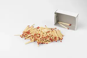 Bright White Background Drucke: Stack of matches in front of almost empty box