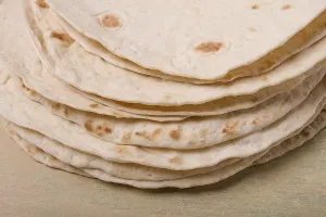 Fast Food Meal Ideas Drucke: A stack of Mexican tortillas, on a gray table