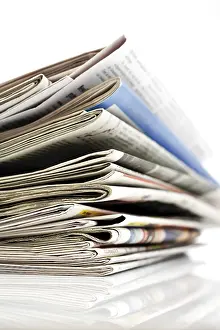 Studio Shot Of Papers Drucke: Stack of newspapers