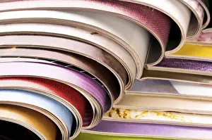 Environmental Conservation Through Reuse Drucke: Stack of open magazines