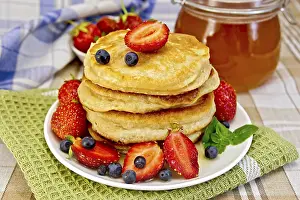 Homemade Pancake Recipes Drucke: A stack of pancakes with strawberries