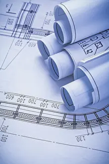 Construction Plan Drawing Drucke: Stack of rolls blueprints close up