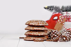 Bavarian Christmas Treats Drucke: Stack of traditional German round glazed gingerbread Christmas cookie called Lebkuchen' Stack of traditional