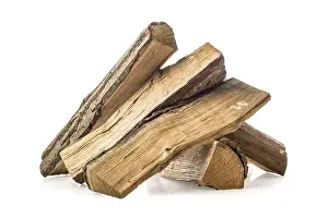 White Studio Background Photo Drucke: Stacked pine firewoods isolated on a white background