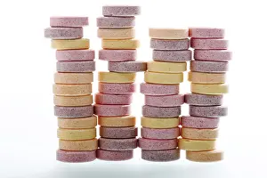 Colourful Food Photography Drucke: Stacks of multicoloured grape sugars