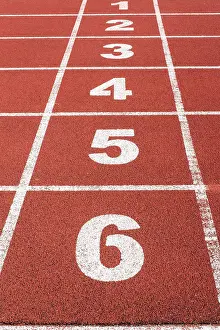 Deserted Sports Stadium Drucke: Stadium running track with the numbers from one to six