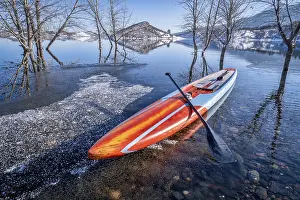 Frozen Lake Photography Drucke: Stand up paddleboard with paddle