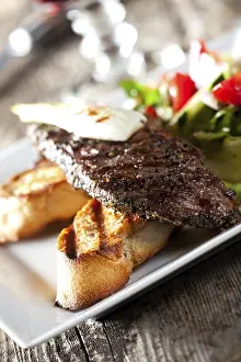 Close Up Steak Drucke: Detail of a steak with salad