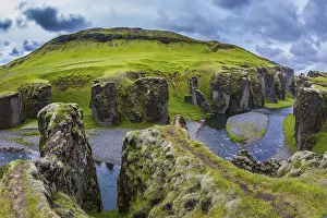Deserted European Landscape Drucke: Steep vertical cliffs surround the stream of very cold water